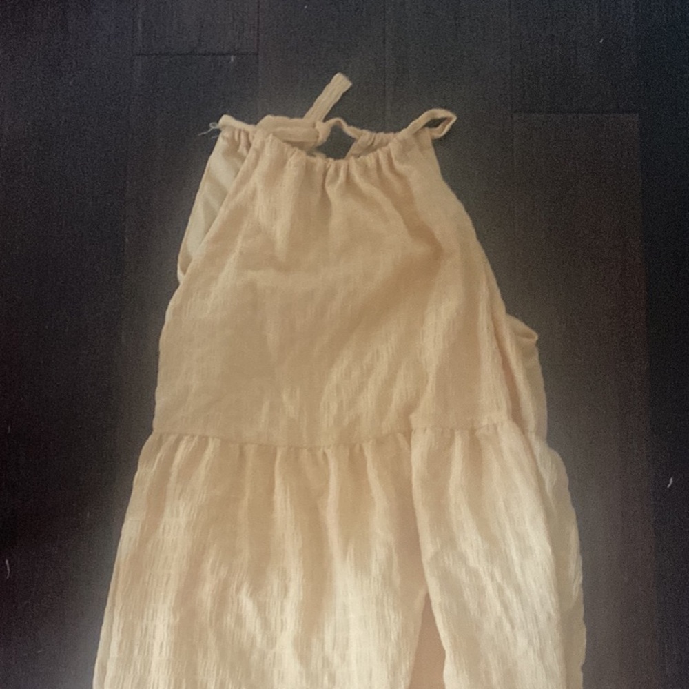 A yellow dress from target that has never been worn